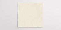 Nasco Stone + Tile's Blake Beige Small Chip terrazzo-look porcelain tile.