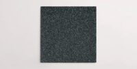 Nasco Stone + Tile's Blake Black Small Chip terrazzo-look porcelain tile.