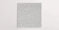 Nasco Stone + Tile's Blake Light Grey Medium Chip terrazzo-look porcelain tile.