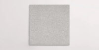 Nasco Stone + Tile's Blake Light Grey Small Chip terrazzo-look porcelain tile.