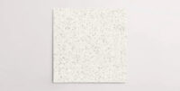 Nasco Stone + Tile's Blake White Medium Chip terrazzo-look porcelain tile.
