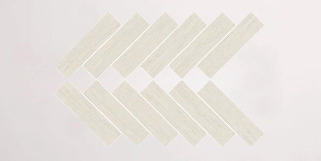 Nasco Stone + Tile Crave Bianco Herringbone Mosaic porcelain tile.