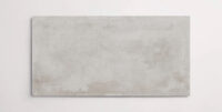 Nasco Stone + Tile 12" x 24" Essence Ash porcelain tile.