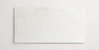 Nasco Stone + Tile 12" x 24" Essence Sand porcelain tile.