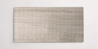 Nasco Stone + Tile 12" x 24" Flumeri Greige Textured porcelain tile.