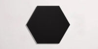 Nasco Stone + Tile Unicolor Extreme Black hexagon porcelain tile.