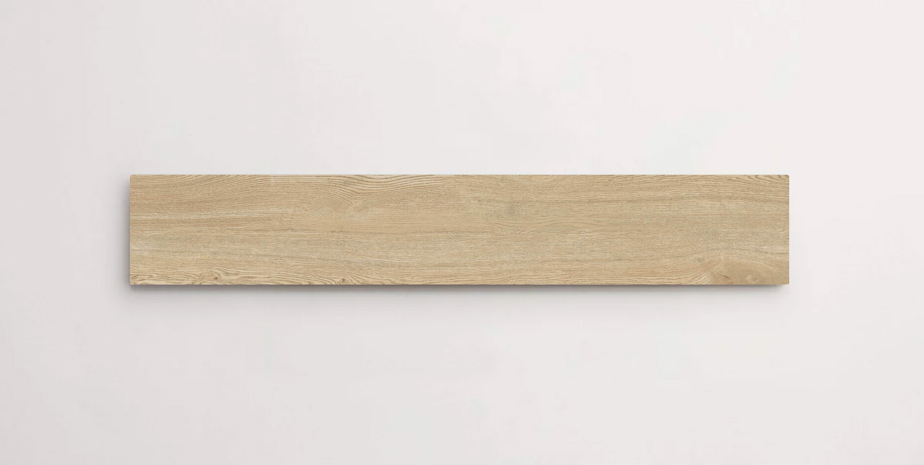 Nasco Stone + Tile Junie Chiaro 8" x 48" wood-look porcelain tile.