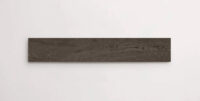Nasco Stone + Tile Junie Dark 8" x 48" wood-look porcelain tile.