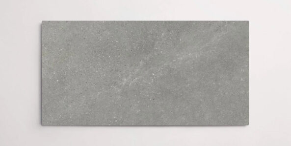 Nasco Stone + Tile Typhoon Dark Grey 12" x 24" porcelain tile.