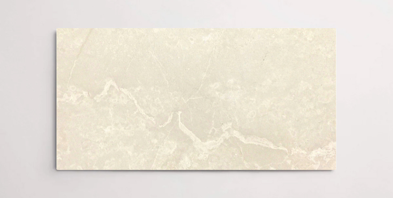 Nasco Stone + Tile Beige Supreme 12" x 24" marble tile.