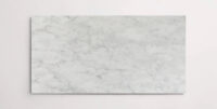 Nasco Stone + Tile Bianco Classico 12" x 24" marble tile.