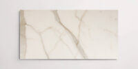 Nasco Stone + Tile Chablis Gold 12" x 24" marble tile.