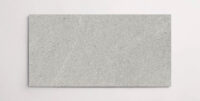 Nasco Stone + Tile Newen Grey 24" x 48" porcelain tile.