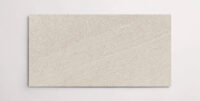 Nasco Stone + Tile 24" x 48" Newen Ivory porcelain tile.