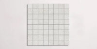 Nasco Stone + Tile Newen White Square Mosaic porcelain tile.