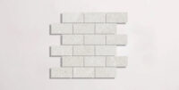 Nasco Stone + Tile Newen White Brick Mosaic porcelain tile.