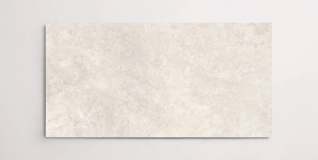 Nasco Stone + Tile 24" x 48" Eternity Ivory porcelain tile.