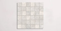 Nasco Stone + Tile Eternity Perle porcelain tile in a square mosaic format.