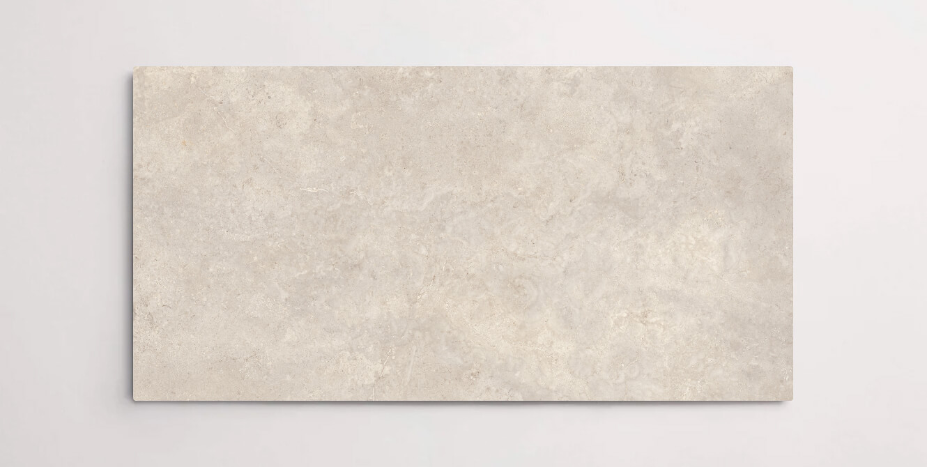 Nasco Stone + Tile 24" x 48" Eternity Sand porcelain tile.