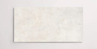 Nasco Stone + Tile 24" x 48" Eternity White porcelain tile.